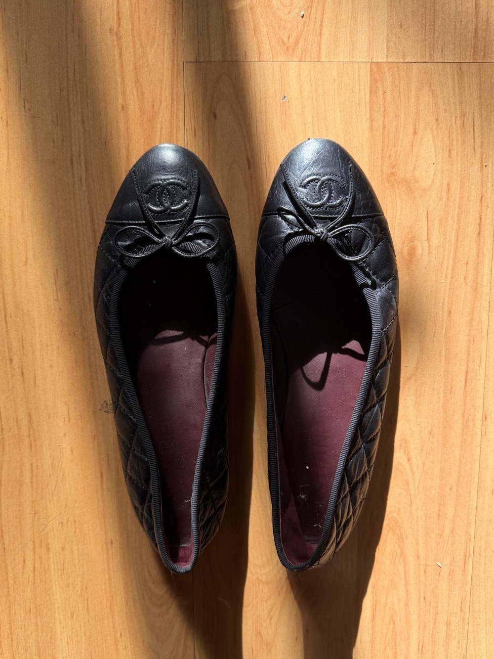 Chanel Quilted Black Leather Ballet Flats with Logo Cap Toe